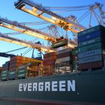 Canva Green and Gray Evergreen Cargo Ship